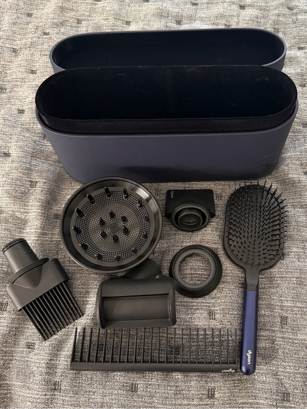 Dyson navy and black hair tool set with paddle brush and attachments